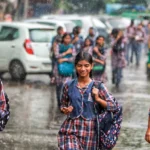 school-children-in-rain-145525618-16x9_0